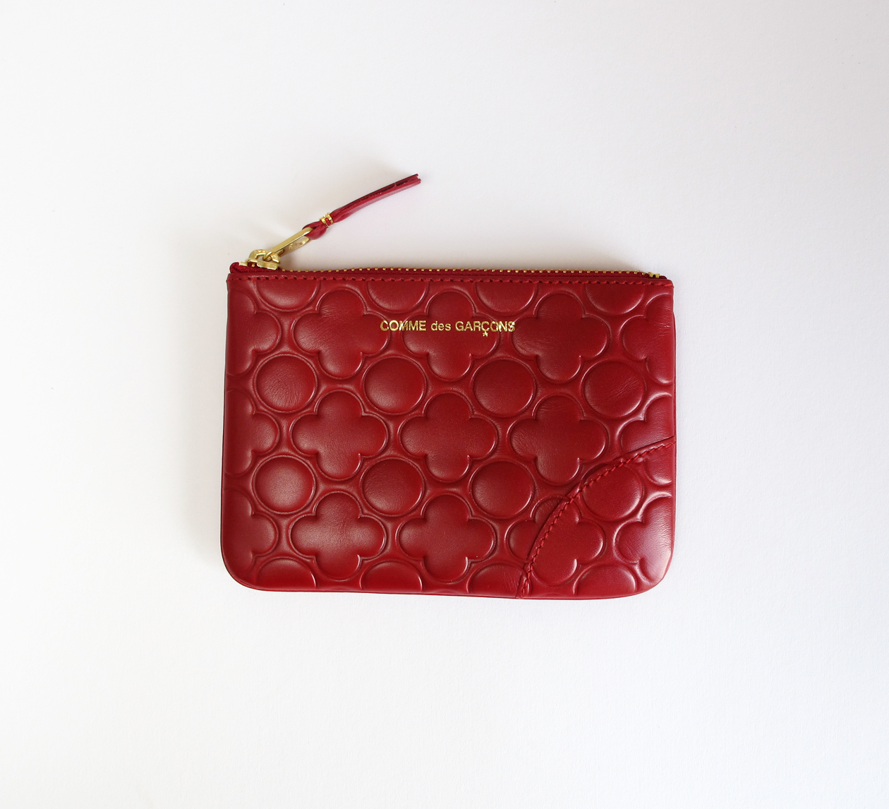 Comme des garcons clearance clover embossed zip wallet