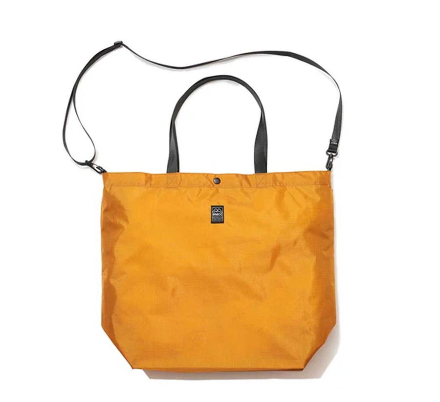 omcc japan, omcc uk stockist, omcc uk, nylon, reusable bag, found bath, found bath uk stockist, Ocean × Mountain × City × Creation, ocean mountain city creation, Large Packable Tote Bag Golden

